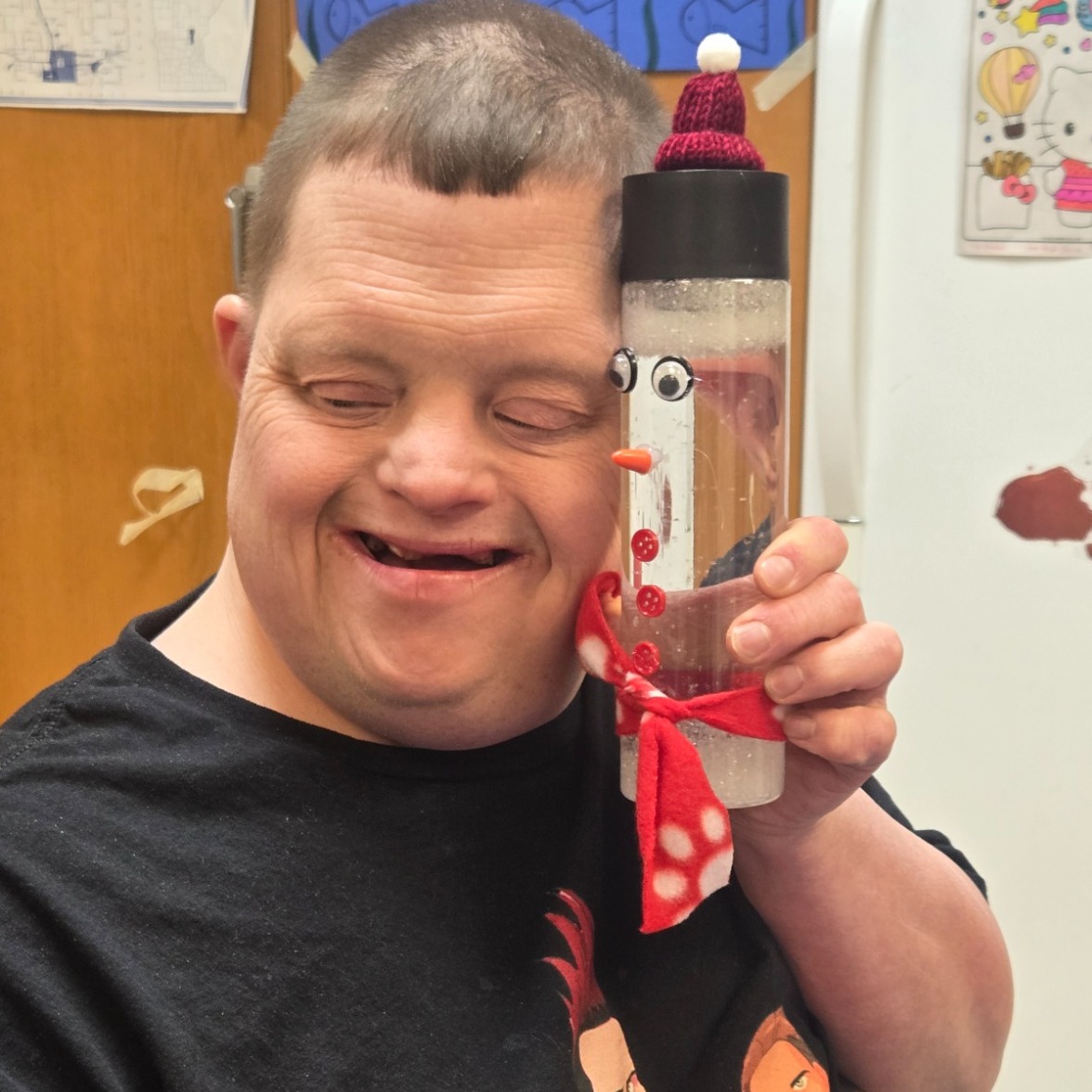 Happy children showing off projects at preschool