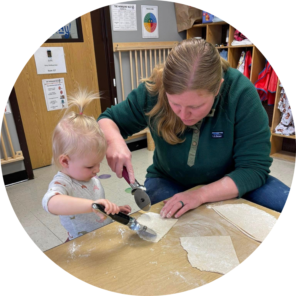 Smiling child in Early Childhood Family Education