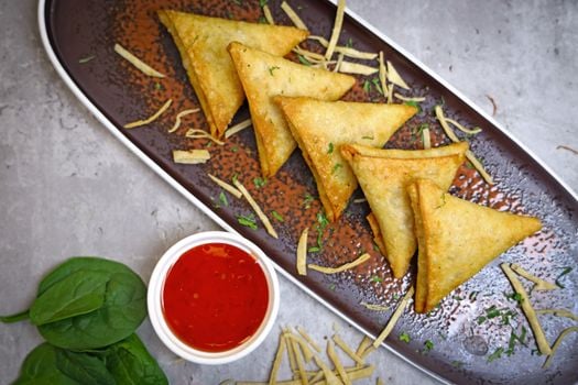 Picture for Homemade Eggrolls and Samosas