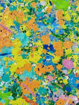 Vibrant abstract splatter art with bright colors and dynamic patterns, perfect for creative projects.